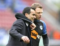wigan asistent manager off la burnley 