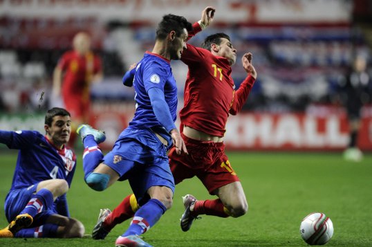 Two goals in the final 15 minutes broke Welsh hearts this evening and moved Croatia level on points with Group A leaders Belgium.