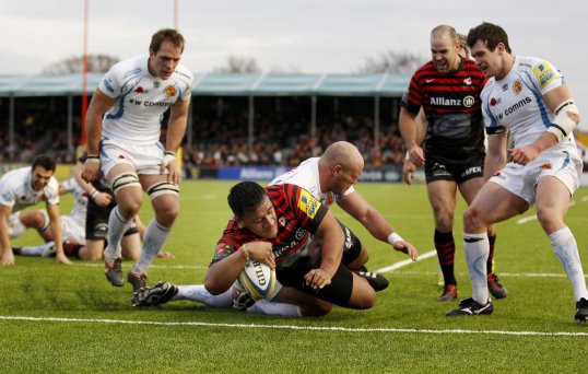 Saracens christened their new home Allianz Park with a bonus point 31-11 win over Exeter Chiefs to move temporarily top of the Premiership.