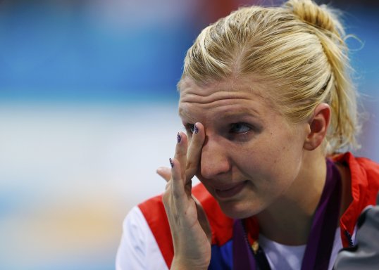 Former double Olympic champion Rebecca Adlington could retire from swimming if she has to seek a new coach.