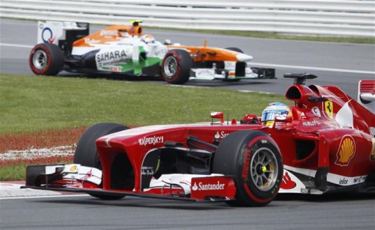 Ferrari’s Fernando Alonso moved up to second place with seven laps to go after a jolly exciting battle with Lewis Hamilton.