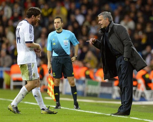 Real Madrid midfielder Xabi Alonso has denied that the team are divided, adding that the squad