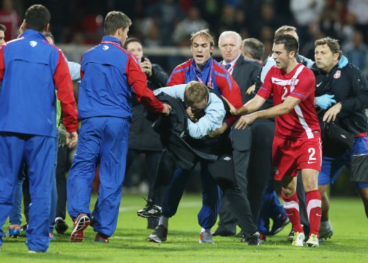 Serbia coach Aleksander Janković insisted his team have nothing to apologise for after England players and officials were attacked last night.