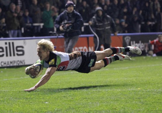 Harlequins moved three points clear at the top of the Premiership with a narrow victory over Gloucester.
