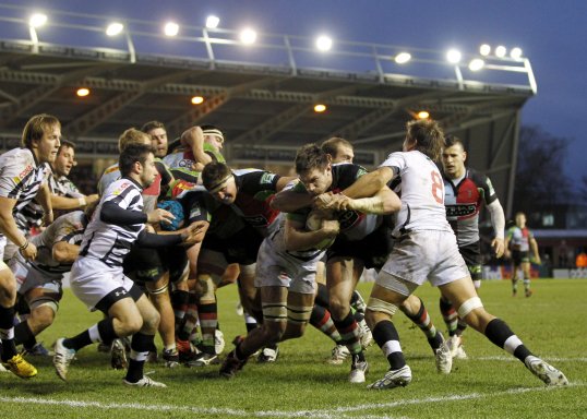 Harlequins battered Italian side Zebre 53-5 to move into contention for a quarter-final place in the Heineken Cup.