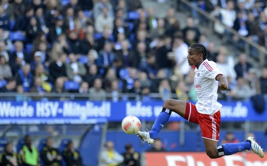 Hamburger SV sporting director Frank Arnesen has backed his defender Michael Mancienne for a place in the England line up.