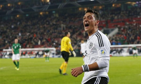 Germany coach Joachim Low was happy with Arsenal midfielder Mesut Ozil’s performance against Republic of Ireland on Friday after the playmaker was given an ‘experimental’ position.