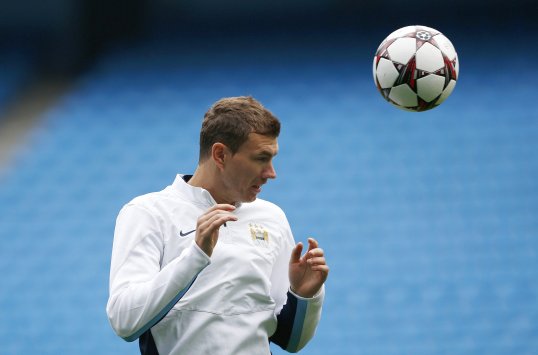 Arsenal are lining up a January move for Manchester City striker Edin Dzeko.
