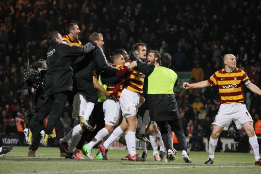 Bradford City director of operations Dave Baldwin has said that the side's win against Arsenal in the League Cup has secured the League Two side's financial future.