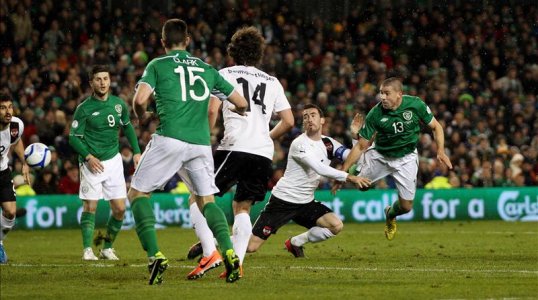 Austria's David Alaba scored deep into second half injury time to snatch a point from the jaws of defeat in an enthralling 2-2 draw with Ireland in Dublin.