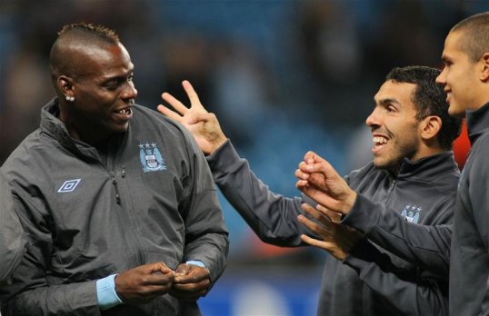 Ex-Manchester City striker Mario Balotelli claims he told Juventus' new signing Carlos Tevez to join him at the San Siro before the 30 year-old opted for the Serie A champions.