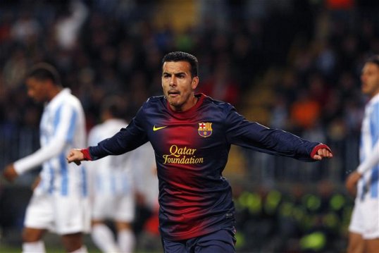 Barcelona out-classed Málaga to set up a semi-final match against Real Madrid in the Copa del Rey.