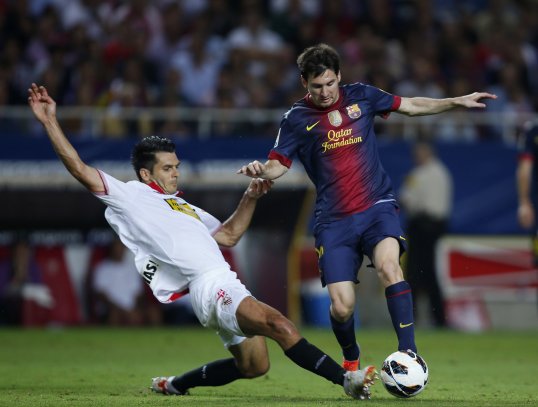 Barcelona fought back from two goals down to beat Sevilla 3-2 tonight.