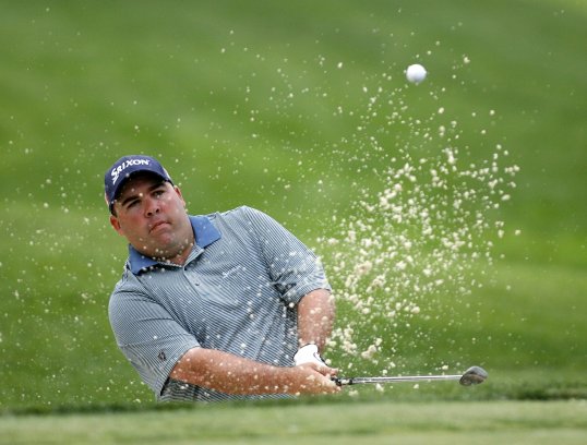 Kevin Stadler claimed the clubhouse lead after carding a seven-under par 64 on a rain-hit first day at The Barclays.