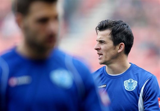 Queens Park Rangers' midfielder Joey Barton has refused reports suggesting that he has held talks with the club over a large pay-out ahead of a transfer to Marseille.