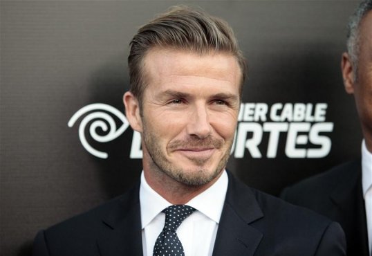 Los Angeles Galaxy midfielder David Beckham has secured a sponsorship deal for his two sons' football teams, according to reports.