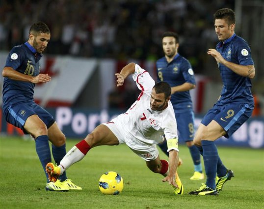 Arsenal striker Olivier Giroud could lose his international place to Real Madrid forward Karim Benzema when France take on Ukraine in a World Cup qualification play-off on Friday.