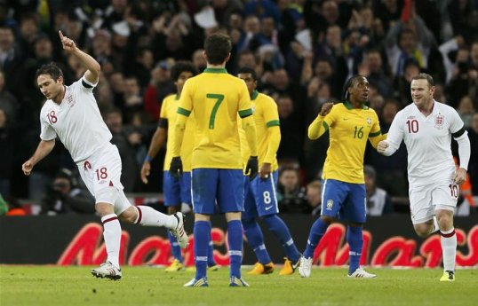 England beat Brazil 2-1 at Wembley with goals from Wayne Rooney and Frank Lampard in a specially arranged game to celebrate the 150th anniversary of the Football Association.