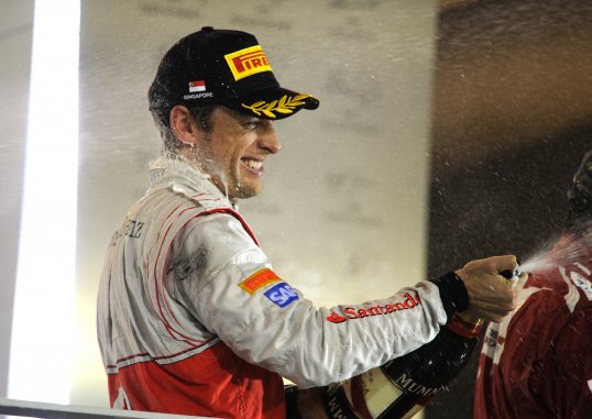 Jenson Button has said the fight for the Formula 1 title fight is between Fernando Alonso and Sebastian Vettel.