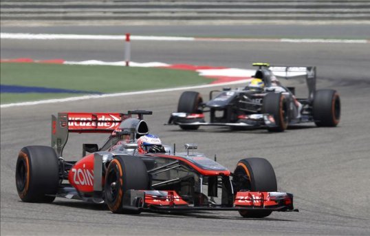 Jenson Button criticised his McLaren teammate Sergio Perez after the Mexican bumped the back of in the Bahrain Grand Prix.