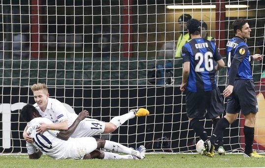 Tottenham Hotspur players were tonight apparently subjected to racist chants by Inter Milan supporters, who were also seen waving an inflatable banana.