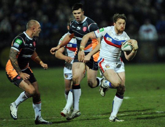Wakefield Trinity Wildcats captain Danny Kirmond will spend a month on the side-lines after undergoing surgery for a knee injury.