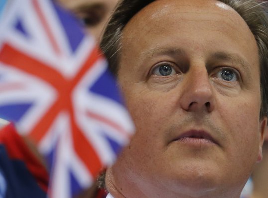 Prime minister David Cameron has backed the Football Association's complaint to Uefa over verbal and physical racist abuse some England U21 players suffered in Serbia.