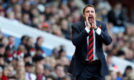Cardiff City manager Malky Mackay praised his players despite suffering defeat to Aston Villa in the Premier League.