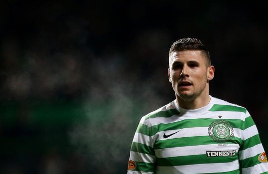 Celtic increased their lead at the top of the Scottish Premier League to 12 points thanks to a 4-0 win over mid-table Dundee United.