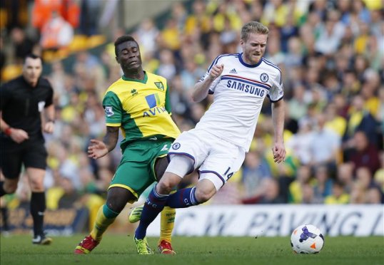 Chelsea winger Andre Schurrle will miss his side’s clash with Cardiff City on Saturday after returning from international duty with a knock.