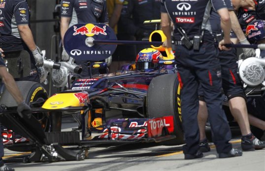 Mark Webber’s early progress from the back of the grid has been halted as he collided with Toro Rosso’s Jean-Eric Vergne.