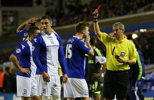 Birmingham City boss Lee Clark is considering appealing against Wade Elliott’s red card against Stoke City on Tuesday night.