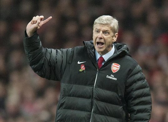 A top football business consultant has urged Arsenal fans to “lay off” Arsène Wenger – and warned the north London club will never win a major trophy while the Premier League is managed “like a circus”.