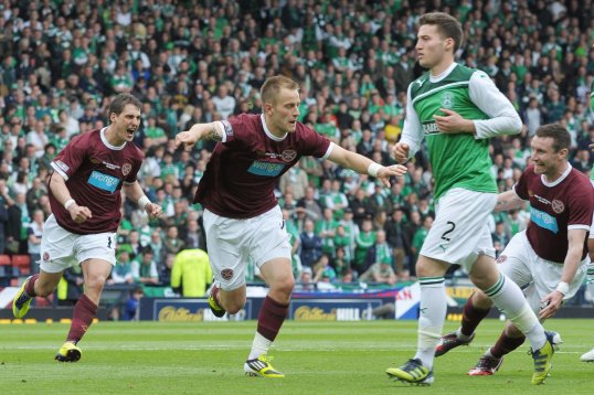 Heart of Midlothian defender Danny Grainger has said that the financial crisis at the club has created a Dunkirk spirit there with everyone working together to overcome the problem.