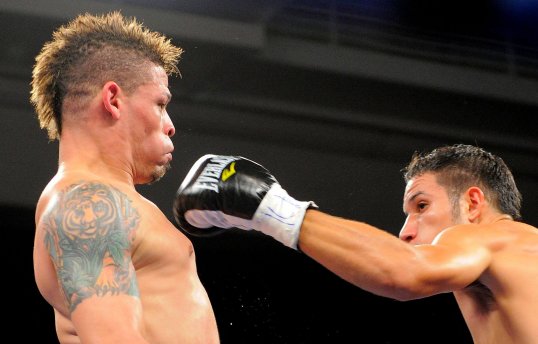 Orlando Cruz has won his first fight since publicly coming out as a homosexual man.