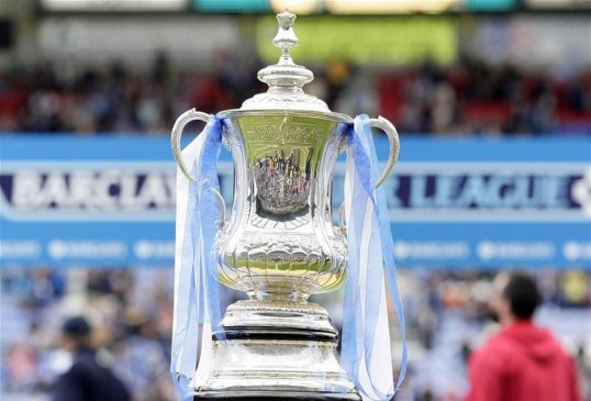 An FA Cup fixture between non-league sides Sleaford Town and Huntingdon Town was abandoned on Saturday after the players started a mass brawl on the pitch.