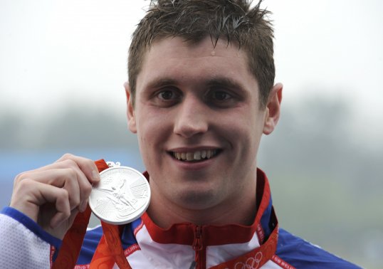 Two-time Olympic medallist David Davies has announced his retirement from swimming.