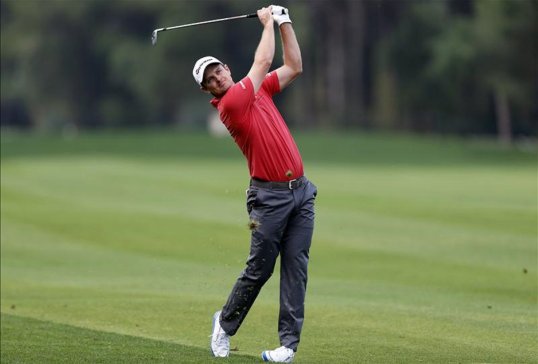 Young Dane Thorbjorn Olesen and Argentine Ricardo Gonzalez held the clubhouse lead after the weather-delayed first round of the inaugural Turkish Airlines Open on Thursday as world number one Tiger Woods was far from his best.
