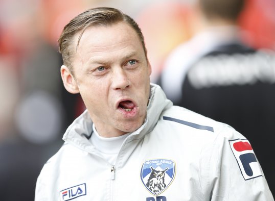 Oldham Athletic manager Paul Dickov has insisted he has the backing of the board despite his senior backroom staff having been put on gardening leave.