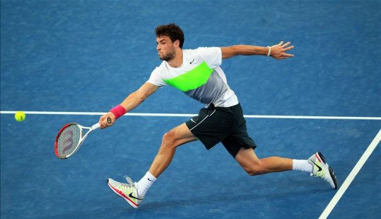 Grigor Dimitrov has caused an upset at the Masters in Monte Carlo after beating world number 10 Janko Tipsarević.