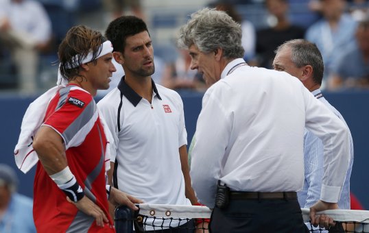 Tennis aces David Ferrer and Novak Djokovic played just 33 minutes before their US Open Semi-final was halted due to severe weather warnings.