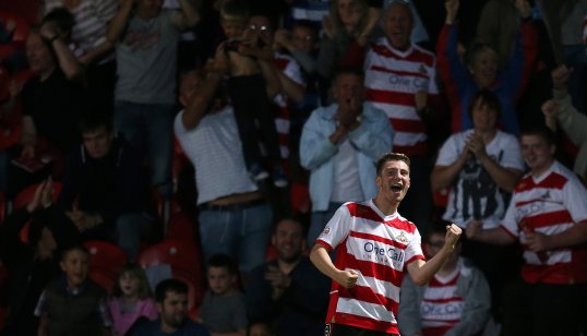 Doncaster Rovers beat Blackburn Rovers on Friday to record their first league victory under boss Paul Dickov.