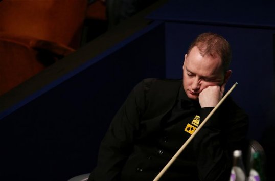 Former world champion Graeme Dott has called for a rule change to stop slow play in snooker.