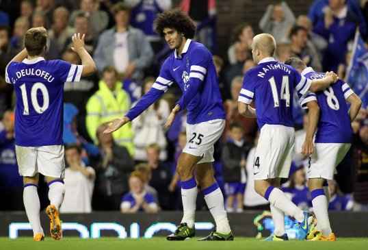 An extra-time goal from Marouane Fellaini gave Everton victory over Stevenage in the League Cup on Wednesday.