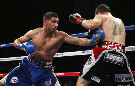 New WBC Silver light-welterweight champion Amir Khan has revealed that his hands are bruised, not broken.