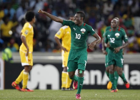Burkina Faso beat Ethiopia 4-0 despite being reduced to ten men just before the hour mark to go top of group C in the African Nations Cup.