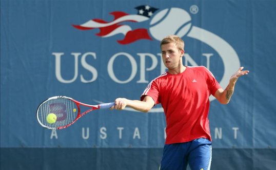 Dan Evans has lost in straight sets to Ivan Dodig in the second tie of the Davis Cup between Great Britain and Croatia.