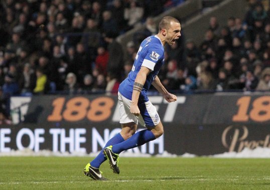 Johnny Heitinga has hinted he may be forced to leave Everton ahead of the 2014 World Cup.