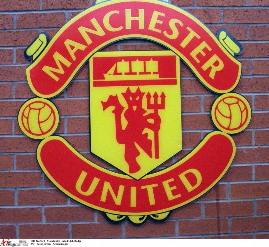 Fan opinion is surprisingly split over whether Manchester United should reintroduce the words “football club” to their badge.