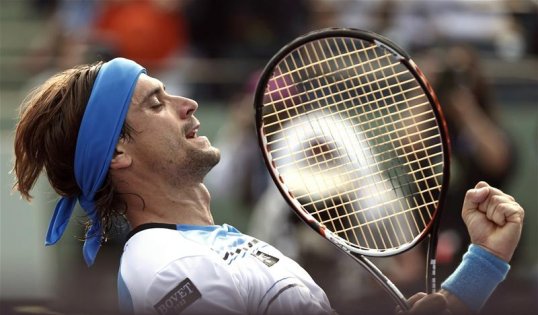 Top seed David Ferrer suffered a shock defeat to qualifier Dmitry Tursunov in the second round of the Barcelona Open.